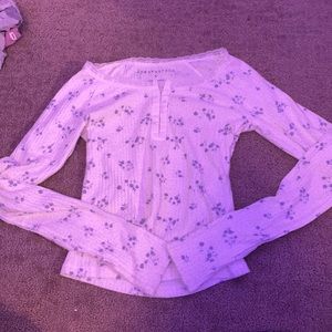 Super cute long sleeve with flowers.